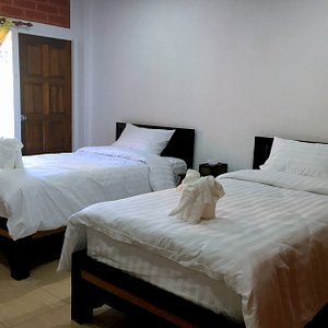 Guesthouse twin room with aircon, balcony and en-suite