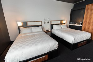 Alt Hotel Halifax Airport in Goffs, image may contain: Furniture, Bed, Bedroom, Monitor