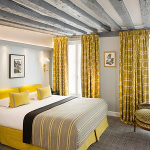 Le Relais Saint-Honore in Paris, image may contain: Bed, Furniture, Hotel, Interior Design