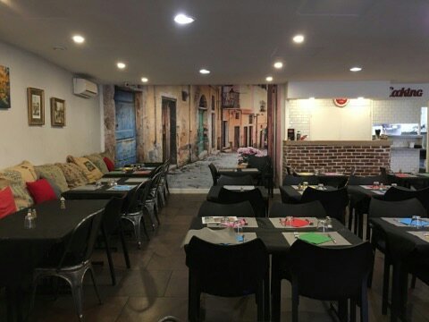 La salle du restaurant et sa terasse