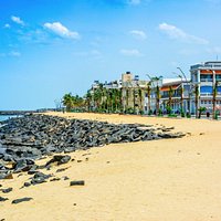 Beautiful Buildings the sky beach and sea in a hot afternoon at Rock Beach, Pondicherry