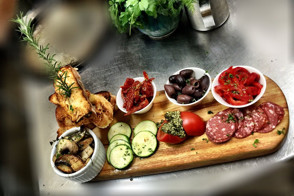 https://dynamic-media-cdn.tripadvisor.com/media/photo-o/0d/06/8a/02/antipasti-plate.jpg?w=1200&h=-1&s=1