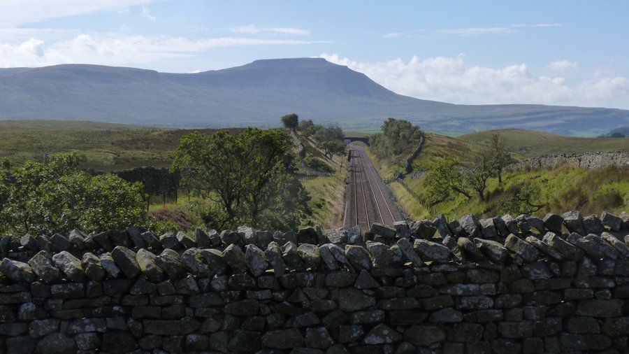 The  aqueduct is hidden between the 2 walls, Ingleborough behind
