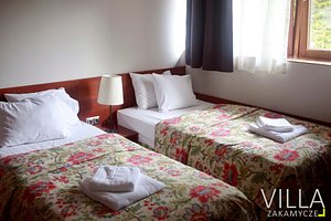 Villa Zakamycze in Krakow, image may contain: Furniture, Bed, Bedroom, Room