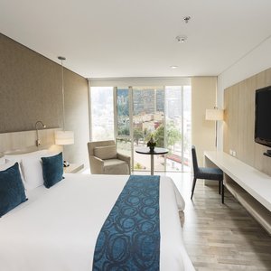 Hotel bh Bicentenario in Bogota, image may contain: Home Decor, Lamp, Furniture, Interior Design