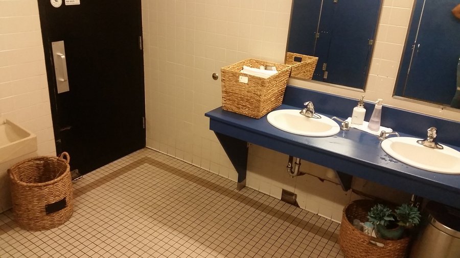 Very "homey" women's restroom with white cotton face cloths!