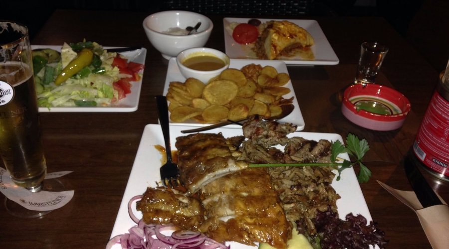 Trio of ribs,Souvlaki and gyro meat w/ Greek salad, potato and a side of moussaka