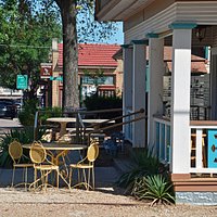 Outdoor seating on the porch or some tables in the yard