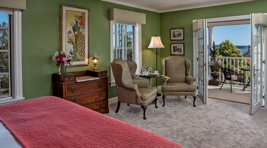 Bay room looking out to the upper veranda and Port Townsend Bay