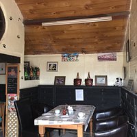 The location of the cafe is nearer the junction than it appears on the map.
Dog cafe open. Huma