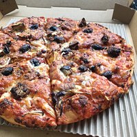 Delicious Pizzas! If you love garlic, get the garlic pizza bread!