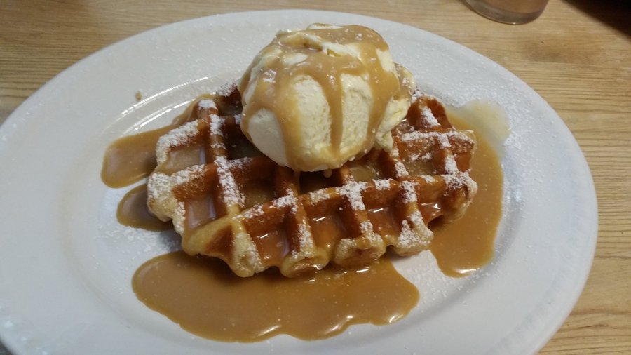 Belgian waffle with ice cream.