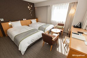 Richmond Hotel Sapporo Ekimae in Sapporo, image may contain: Dorm Room, Furniture, Bedroom, Remote Control