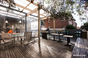 Cambridge Lodge Guest House in Stanmore, image may contain: Porch, Housing, Deck, Dining Table