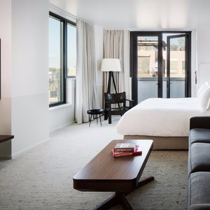 Pull back the shades and wake to the bright Denver sunshine in one of our Corner Rooms. 