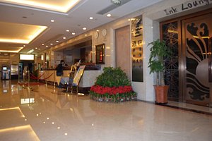 Jingtailong International Hotel in Beijing, image may contain: Airport, Shopping Mall, Plant, Potted Plant