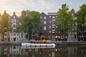 Pulitzer Amsterdam in Amsterdam, image may contain: Neighborhood, Waterfront, Condo, City