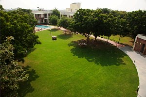 The Chitvan Resort in Ajmer, image may contain: Grass, Backyard, Lawn, Garden