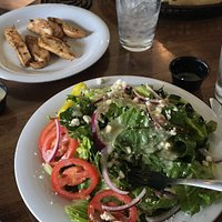 Greek salad minus the red peppers. Delicious! Chicken on the side-so flavorful and juicy.