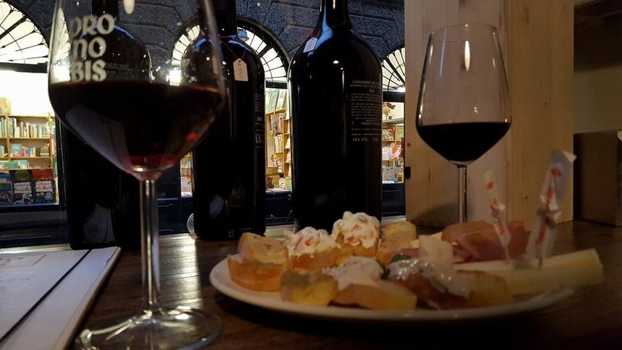 Enjoying a glass of cabernet and small bites at the wine bar on a Friday evening.