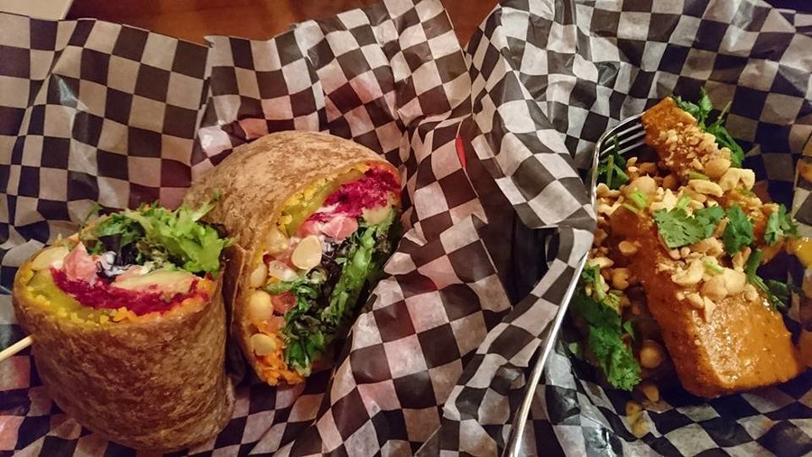 veggie wrap with garlic sauce and peanut tofu fingers