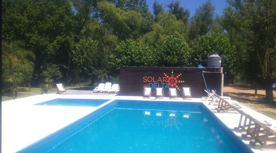 Pileta con solarium