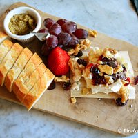 cheese board - goat cheese with cranberries and walnuts, side of tapenade