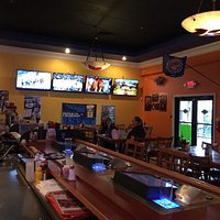 A good place to stop by and have a burger and some wings. The bar tender is handsome and very ni