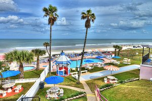 Tropical Manor in Daytona Beach Shores, image may contain: Resort, Hotel, Building, Water
