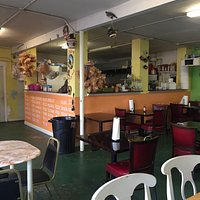 Outside view, the delicious food, and shots from inside the restaurant