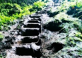 The muddy and slippery trail to the cave