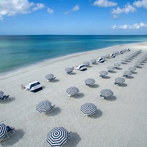 Beautiful new beach umbrellas and chairs overlooking the Gulf of Mexico