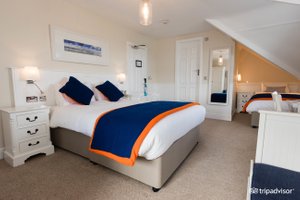Trearddur Bay Hotel in Anglesey, image may contain: Furniture, Indoors, Bedroom, Bed