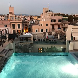Roof terrace splash pool by night
