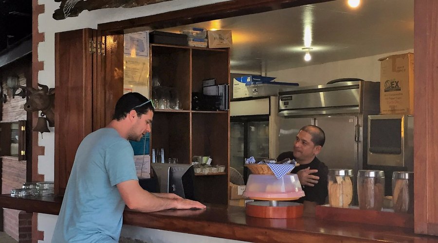 Grabbing a quick snack at the bar