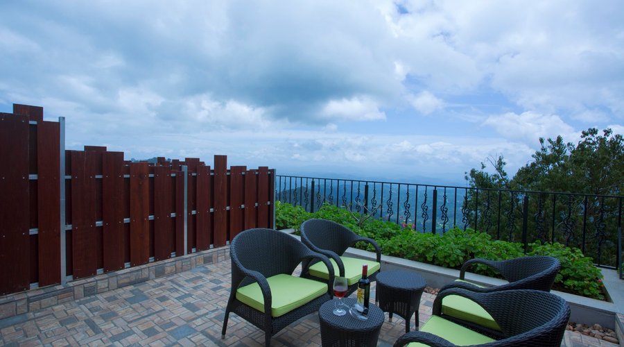 balcony seating at Moonlight bliss rooms.A perfect place to unwind  the evenings...