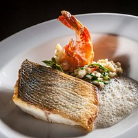 Branzino mit Tomaten-Rucolarisotto und Garnele