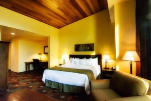 The Mill Casino Hotel in North Bend, image may contain: Hotel, Resort, Interior Design, Bed