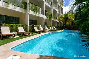 Hotel Posada Sian Ka'an in Playa del Carmen, image may contain: Hotel, Resort, Villa, Pool