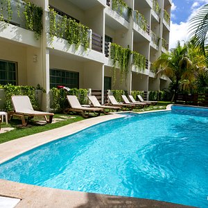 Hotel Posada Sian Ka'an in Playa del Carmen, image may contain: Hotel, Resort, Villa, Pool