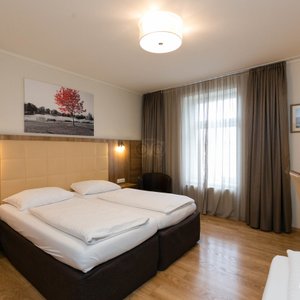 The Triple Room at the Goldenes Theater Hotel