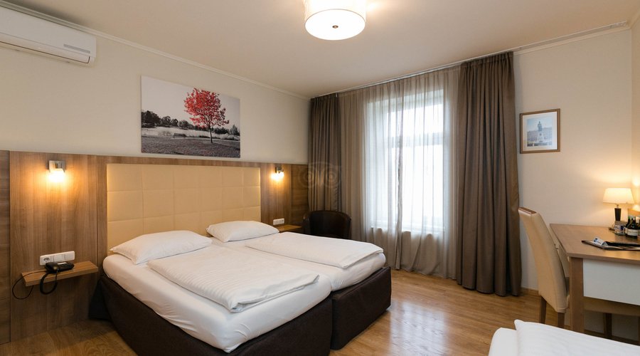 The Triple Room at the Goldenes Theater Hotel