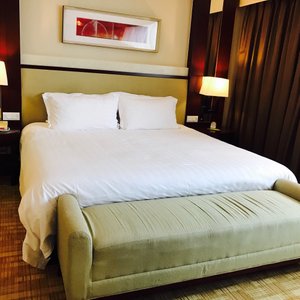 Ocean Hotel Shanghai in Shanghai, image may contain: Cushion, Home Decor, Furniture, Bed