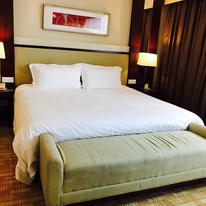 Ocean Hotel Shanghai in Shanghai, image may contain: Cushion, Home Decor, Furniture, Bed