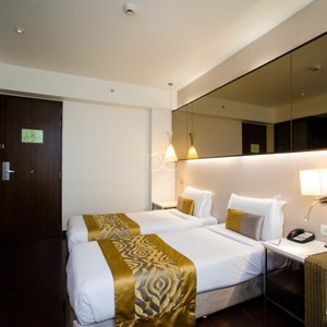 The Sahil Hotel in Mumbai, image may contain: Chair, Furniture, Hotel, Bed