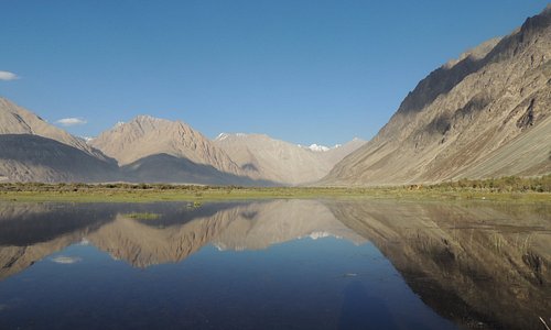 A water body before Diskit Gompa, perfect mirror view