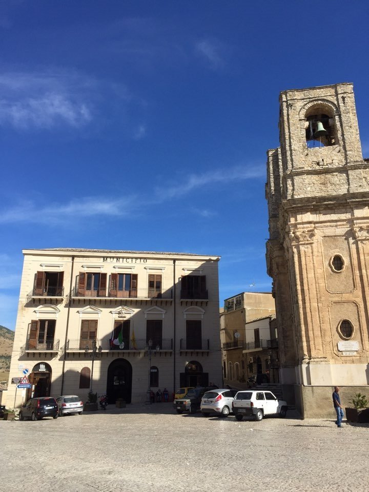 Scenic view of Piazza Umberto I in Palazzo Adriano, Sicily, showing the square and the Cinema Paradiso Museum.