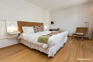 Casa Calma Hotel in Buenos Aires, image may contain: Interior Design, Furniture, Home Decor, Bed