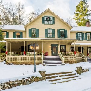 This grand old house wears winter white well!