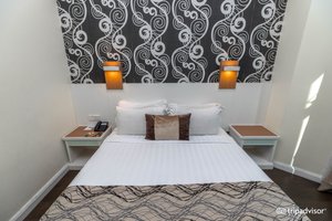 Regalodge Hotel Ipoh in Ipoh, image may contain: Cushion, Home Decor, Furniture, Bedroom